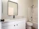 Clean bathroom with white vanity, bathtub, and shower at 4249 S Pony Rider Trl, Gold Canyon, AZ 85118