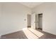 Cozy bedroom with carpet and a large closet at 4249 S Pony Rider Trl, Gold Canyon, AZ 85118