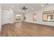 Living room with hardwood floors, recessed lighting and multiple windows at 4249 S Pony Rider Trl, Gold Canyon, AZ 85118