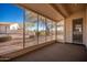 Screened patio offering backyard views at 4249 S Pony Rider Trl, Gold Canyon, AZ 85118