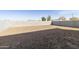 Large backyard with block wall and ample space at 4961 W Walatowa St, Laveen, AZ 85339