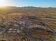 Aerial view of property with multiple buildings, arena, and large lot at 49651 W Dune Shadow Rd, Maricopa, AZ 85139