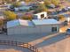 Aerial view of a large metal building on a property at 49651 W Dune Shadow Rd, Maricopa, AZ 85139