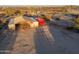 Aerial view of a barn with a red RV parked nearby at 49651 W Dune Shadow Rd, Maricopa, AZ 85139