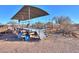 Covered seating area with steps and metal railings at 49651 W Dune Shadow Rd, Maricopa, AZ 85139