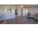 Living room with hardwood floors and a view of the kitchen at 49651 W Dune Shadow Rd, Maricopa, AZ 85139