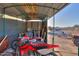 Interior of metal shed with various items stored inside at 49651 W Dune Shadow Rd, Maricopa, AZ 85139