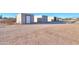 Three separate storage units in a desert setting at 49651 W Dune Shadow Rd, Maricopa, AZ 85139