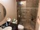 Bathroom with a walk-in shower and granite vanity at 5215 W Acapulco W Ln, Glendale, AZ 85306