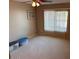 Bright bedroom with carpeted floor and large window at 5215 W Acapulco W Ln, Glendale, AZ 85306