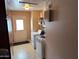 Laundry room with washer, dryer, and exterior access at 5215 W Acapulco W Ln, Glendale, AZ 85306