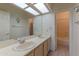 Clean bathroom with double sinks and a shower/tub combo at 5335 W Bloomfield Rd, Glendale, AZ 85304