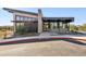 Modern community center with large windows and bike rack at 5819 E Rose Garden Ln, Phoenix, AZ 85054