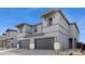 Beautiful two-story home featuring a gray exterior, two-car garage, and modern architectural details at 5819 E Rose Garden Ln, Phoenix, AZ 85054