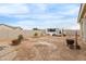 Large backyard with fire pit and partial view of shed at 5830 E Fox Hollow Ln, San Tan Valley, AZ 85140