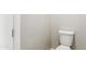 Simple, clean bathroom with a toilet and neutral color scheme at 5846 E Ringtail Way, Phoenix, AZ 85054