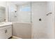 Modern bathroom with a large shower and a single vanity at 5846 E Ringtail Way, Phoenix, AZ 85054