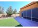 Artificial turf, gravel, and a screened patio at 6830 S Crystal Way, Chandler, AZ 85249