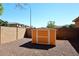 Small orange storage shed in backyard at 6830 S Crystal Way, Chandler, AZ 85249