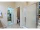 Bathroom with shower, toilet and access to closet at 6830 S Crystal Way, Chandler, AZ 85249