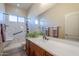 Accessible bathroom with walk-in shower and modern vanity at 6830 S Crystal Way, Chandler, AZ 85249