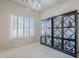 Formal dining room with large windows and decorative cabinetry at 6830 S Crystal Way, Chandler, AZ 85249