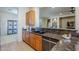 Modern kitchen with granite countertops and ample wood cabinetry at 6830 S Crystal Way, Chandler, AZ 85249