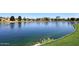 Peaceful lake view with homes in background at 6830 S Crystal Way, Chandler, AZ 85249