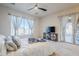 Bright bedroom with sliding glass doors leading to patio at 6830 S Crystal Way, Chandler, AZ 85249