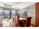 Dining area with a wooden table and orange leather chairs at 7167 E Rancho Vista Dr # 4011, Scottsdale, AZ 85251