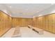 Clean and spacious locker room with wooden benches at 7167 E Rancho Vista Dr # 4011, Scottsdale, AZ 85251