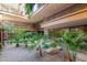 Private patio with gravel and tropical plants at 7167 E Rancho Vista Dr # 4011, Scottsdale, AZ 85251