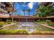 Serene water feature with a cascading waterfall, enhancing the property's aesthetic appeal at 7167 E Rancho Vista Dr # 4011, Scottsdale, AZ 85251