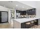 Modern kitchen with sleek cabinetry and large island at 7760 E Gainey Ranch Rd # 18, Scottsdale, AZ 85258