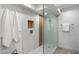 Modern bathroom with a walk-in shower and hexagonal floor tiles at 7760 E Gainey Ranch Rd # 30, Scottsdale, AZ 85258