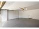 Spacious garage with epoxy flooring and extra storage at 7760 E Gainey Ranch Rd # 30, Scottsdale, AZ 85258