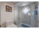 Bathroom with a walk-in shower, toilet and decorative tile at 7800 E Lincoln Dr # 1029, Scottsdale, AZ 85250