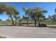 Scenic view of a lush green golf course from a paved path at 7800 E Lincoln Dr # 1029, Scottsdale, AZ 85250