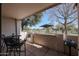 Covered patio with seating, grill, and golf course view at 7800 E Lincoln Dr # 1029, Scottsdale, AZ 85250