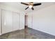 Spacious bedroom with mirrored closet doors and polished floors at 8014 E Oak St, Scottsdale, AZ 85257