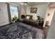 Living room featuring a fireplace, couch and patterned rug at 8014 E Oak St, Scottsdale, AZ 85257