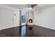 Bright living room featuring a fireplace and dark hardwood floors at 8014 E Oak St, Scottsdale, AZ 85257