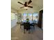 Sunlit dining area with round table and chairs, offering ample natural light at 8700 E University Dr # 633, Mesa, AZ 85207