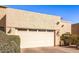 Attached garage with double doors and landscaping at 943 E Kortsen Rd # 10, Casa Grande, AZ 85122