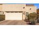 Attached garage with double doors and landscaping at 943 E Kortsen Rd # 10, Casa Grande, AZ 85122