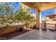 Private patio with built-in grill and relaxing seating area at 943 E Kortsen Rd # 10, Casa Grande, AZ 85122