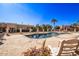 Community pool area with plenty of seating at 943 E Kortsen Rd # 10, Casa Grande, AZ 85122