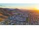 Aerial view of community and surrounding mountain range at 9831 S 11Th St, Phoenix, AZ 85042