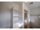 Spacious bedroom closet with built-in shelving at 10332 W Devonshire Ave, Phoenix, AZ 85037