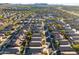 Aerial view of a residential neighborhood, with distant mountain views at 10808 W Cottontail Ln, Peoria, AZ 85383